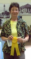 Lynnette accepting award